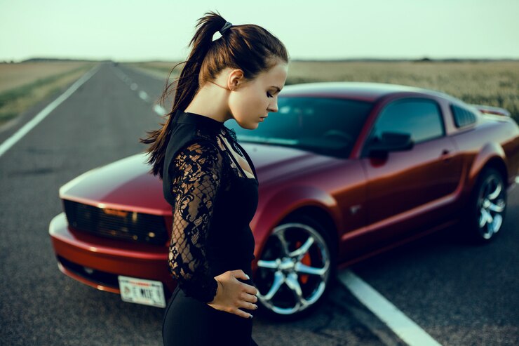 young-beautiful-girl-posing-near-expensive-red-car-powerful-car_1296-741